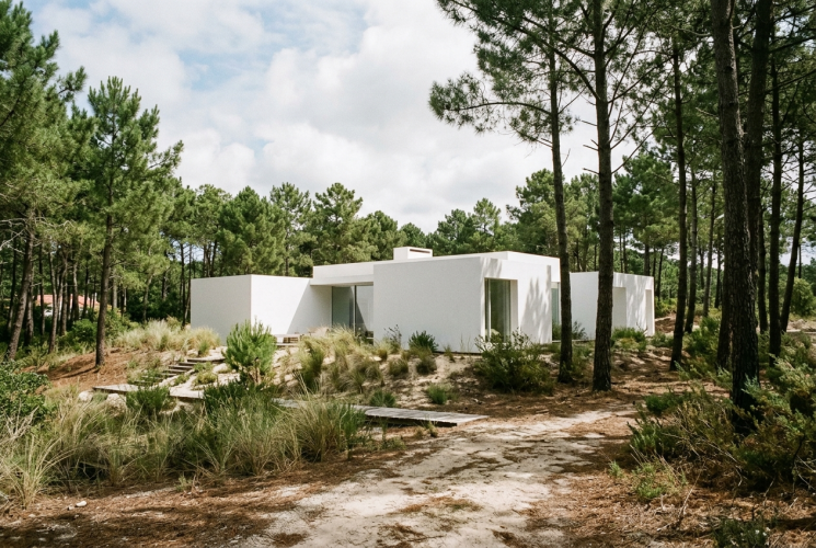Casa da Volta minimalist white architectural sanctuary in pine forest dunes of Comporta Portugal